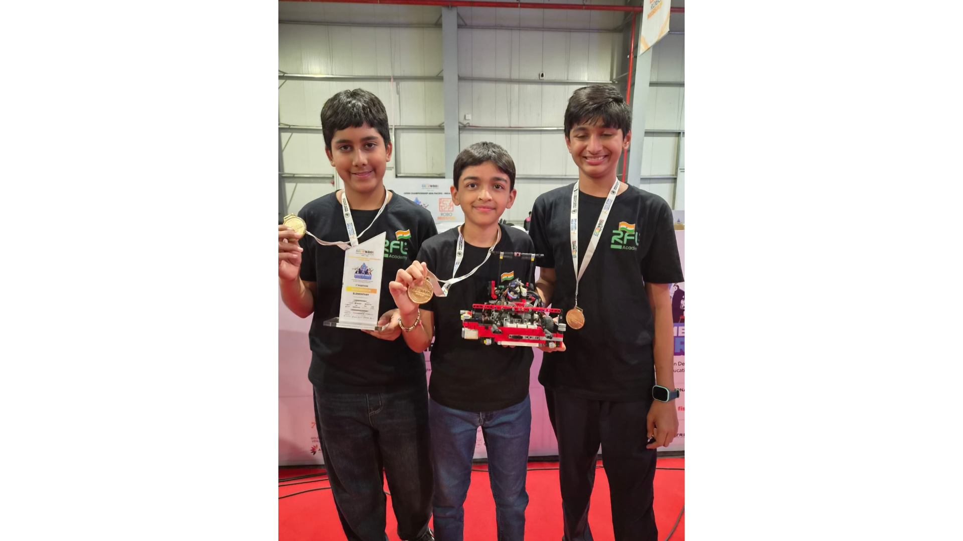 Image of Aryaman, Hetansh & Prithiv with Gold Medal.